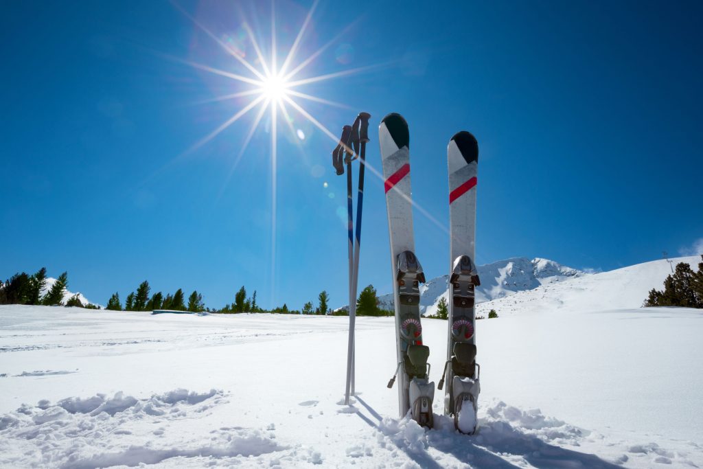 46627100 - skiing, winter season , mountains and ski equipment on ski run