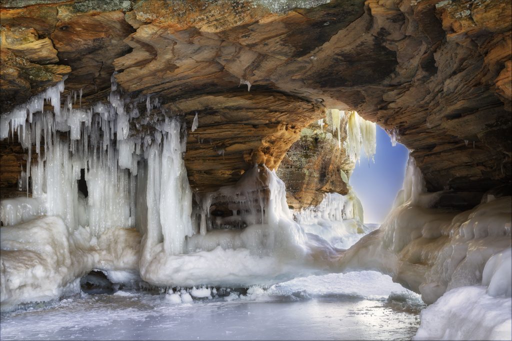 37327872 - a beautiful natural arch on lake superior covered in ice
